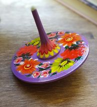 Handmade wooden spinning top, eco toy with traditional ukrainian painting
