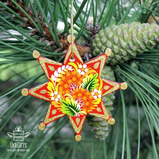 Rot-goldener Weihnachtsbaumschmuck Sterne aus Holz - traditionelles Kunsthandwerk