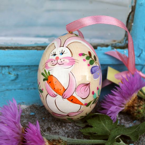 Painted Easter egg with the rabbit pattern, rustic handmade