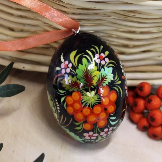 Wooden Easter egg pysanka with bird pattern
