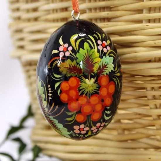 Wooden Easter egg pysanka with bird pattern