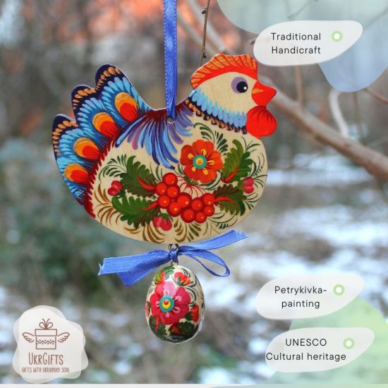 Pretty handmade Easter chicken with an egg -  wooden traditionel Easter ornaments