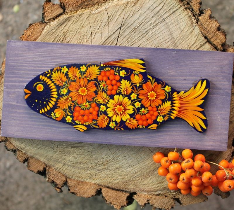 Handcrafted Fish wall decoration on purple wood