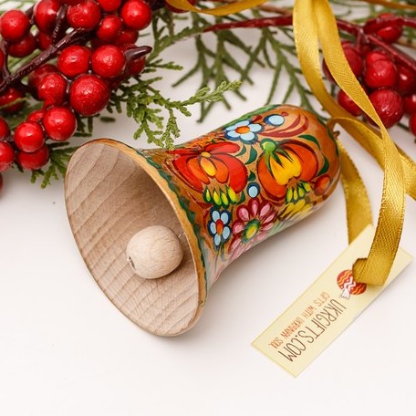 Christmas bell ornament, golden with a floral pattern