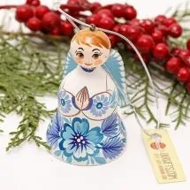 Christmas angel and bell made of wood, white and blue