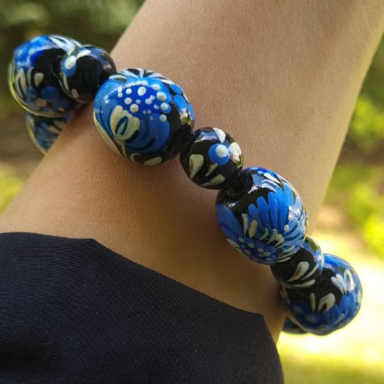 Wooden bracelet with -black and blue - from hand painted beads