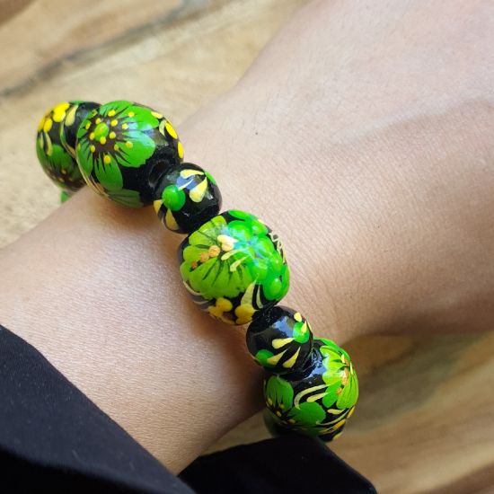 Wooden bracelet with -black and green - from hand painted beads